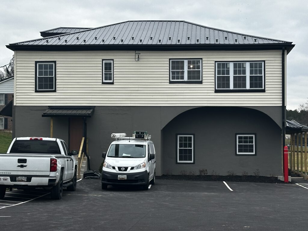 Two-story building with metal roof at 15149 Bloyers Ave
