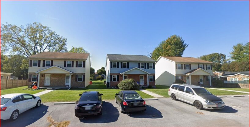 three adjacent twin townhomes, totaling six units